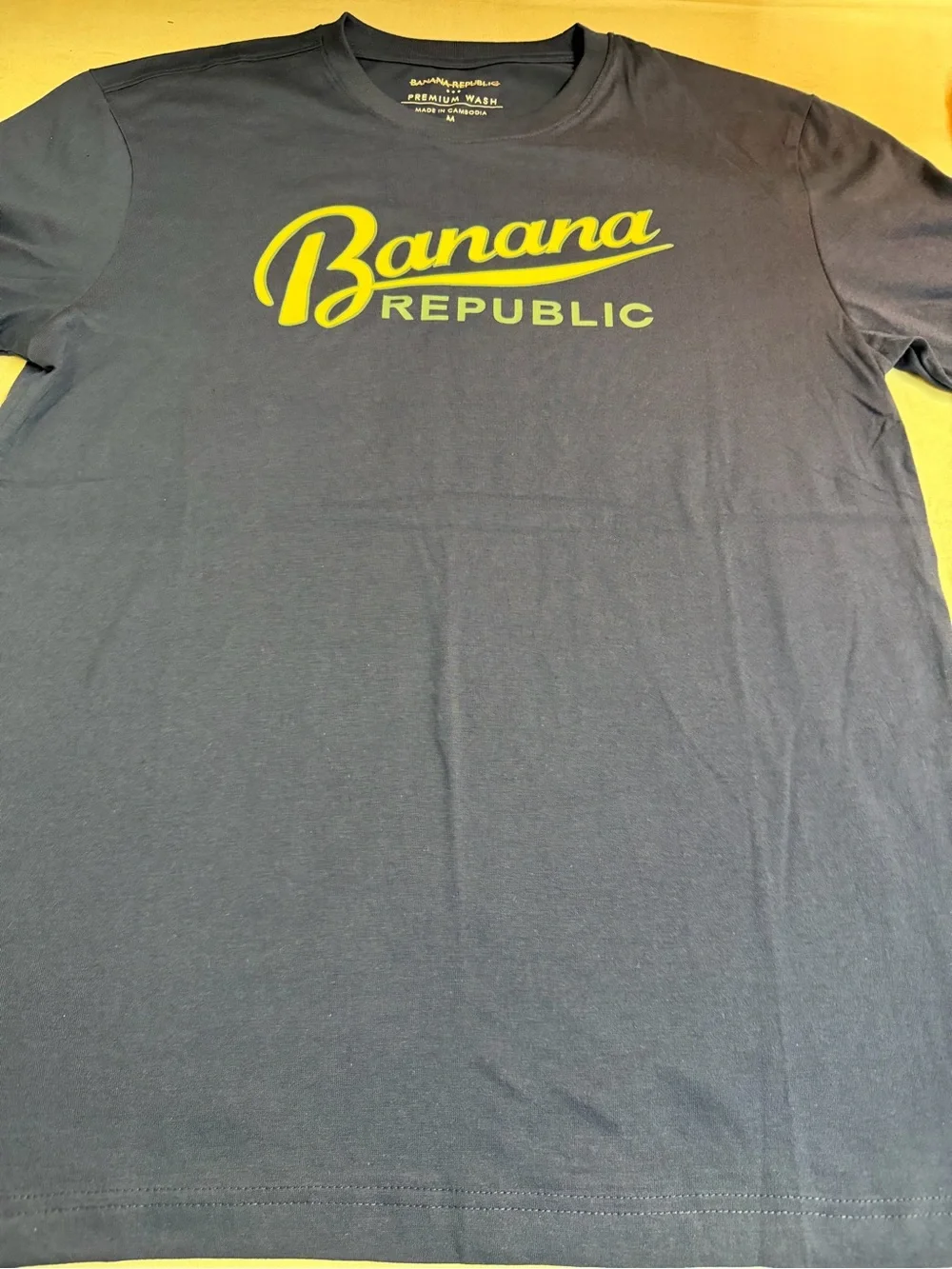 Banana Republic Men's Navy T-Shirt with Yellow Logo
